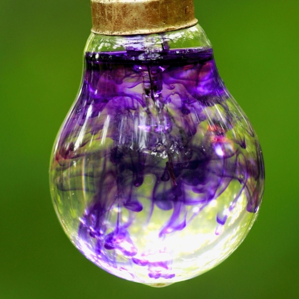 A lightbulb full of swirling colours