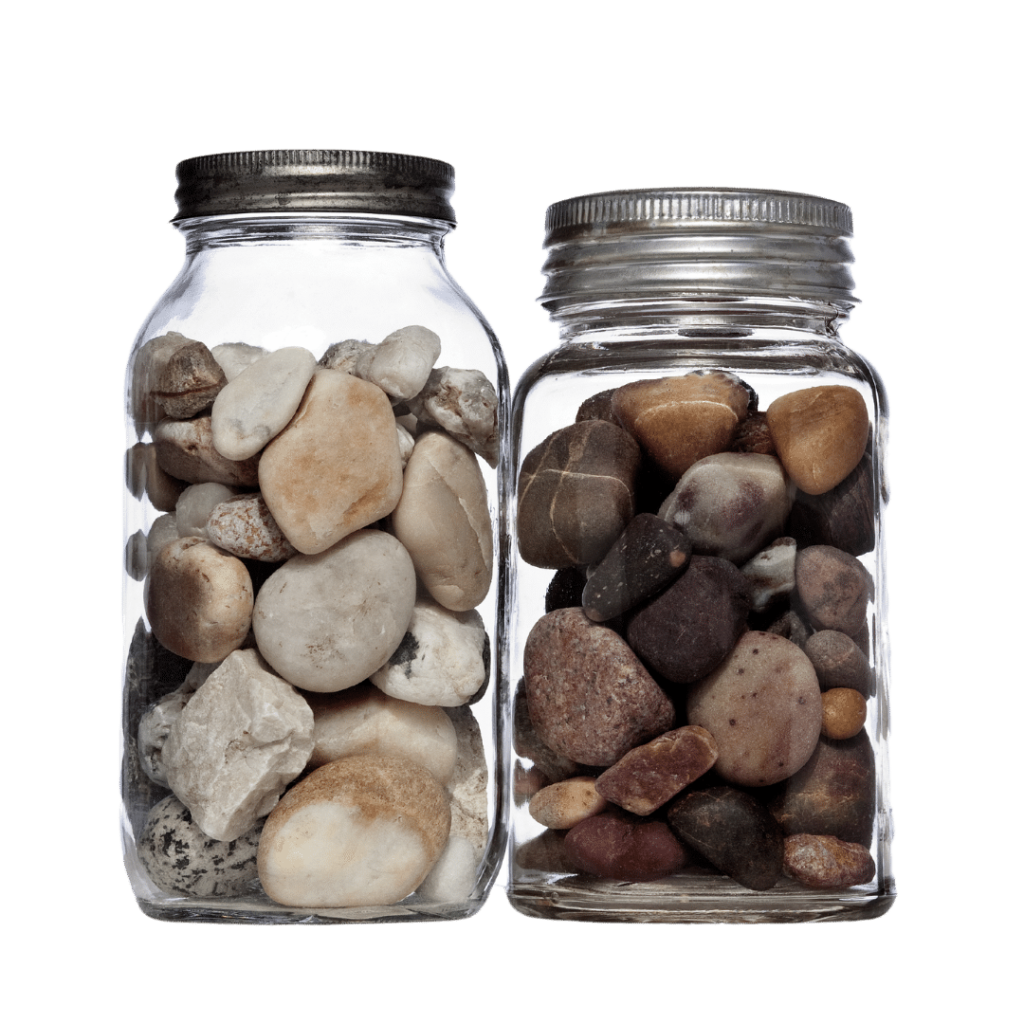 two glass jars filled with pebbles